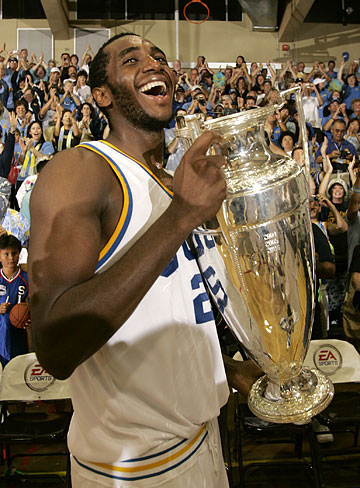 Luc holding the trophy after UCLA won the Maui Invitational November 23 2006